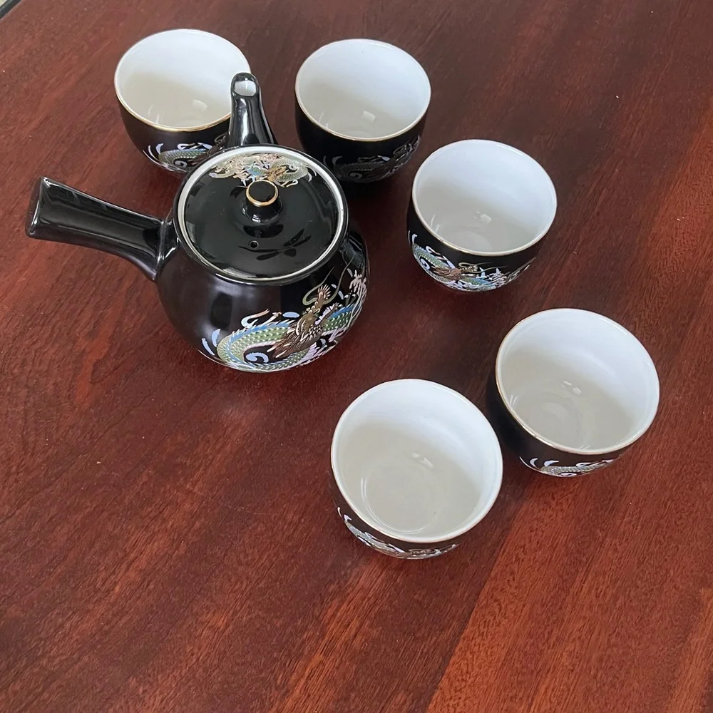 Japanese 7 piece tea set with 5 cups and a tea pot in gold dragon pattern